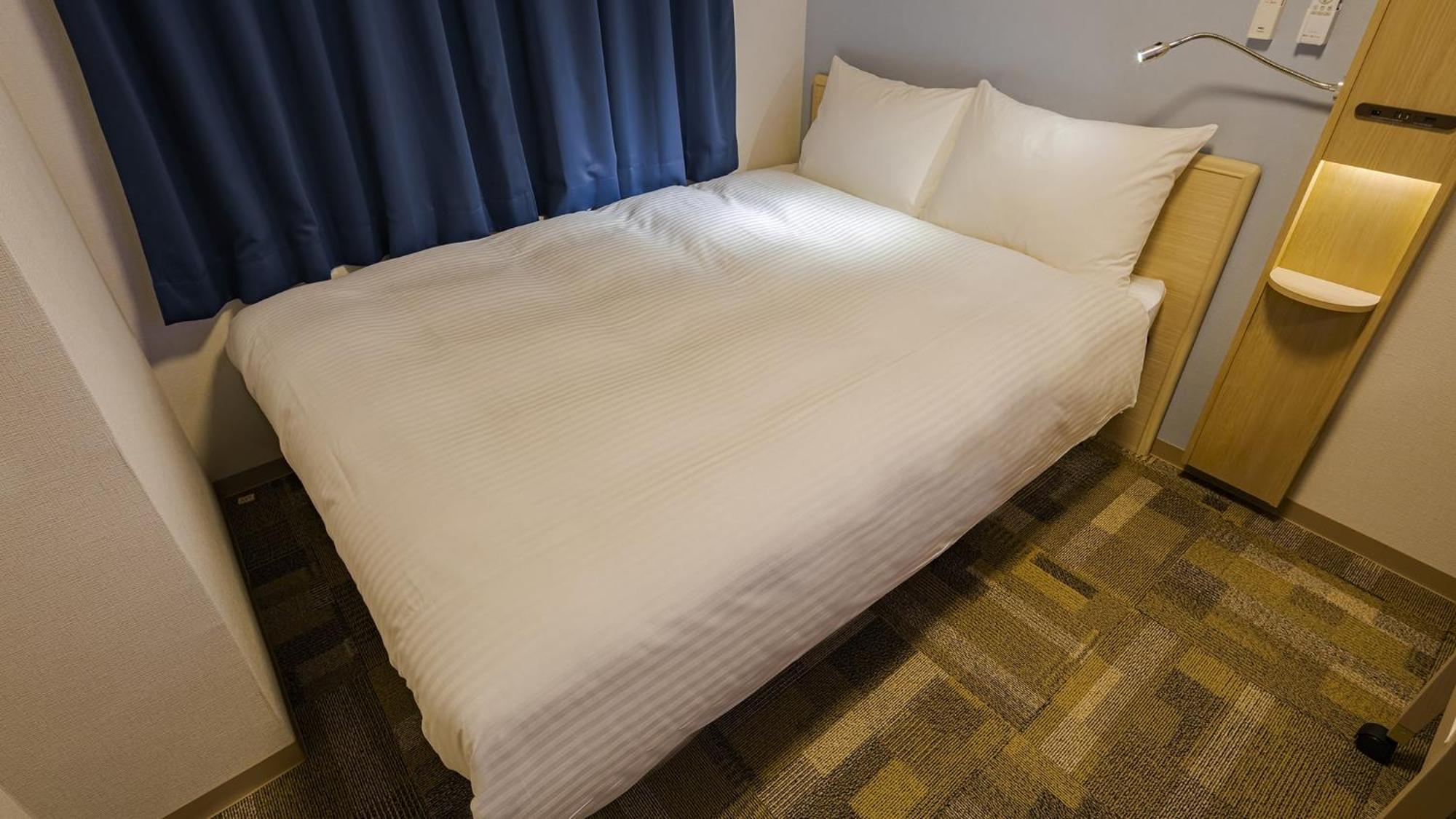 Toyoko Inn Nagoya Meieki Minami Zimmer foto